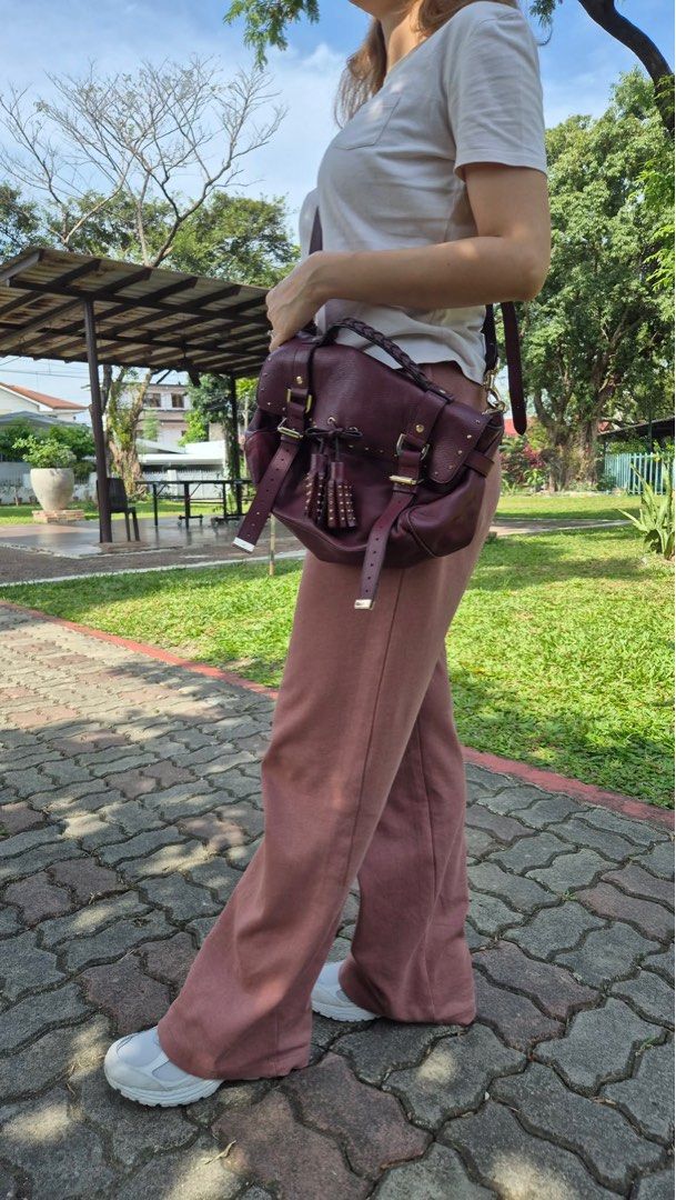Mulberry burgundy bag (Category: Luxury Bags & Wallets) located in Quezon City. Submitted by tan__k (Listing ID 1373284014, Image 3). Description: authentic personally owned Good used condition comes w dustbag Will send more photos to serious buyers 12.5” L x 6” W x 7.75” H Closure/Opening: Flap top with double magnetic snap closure.
