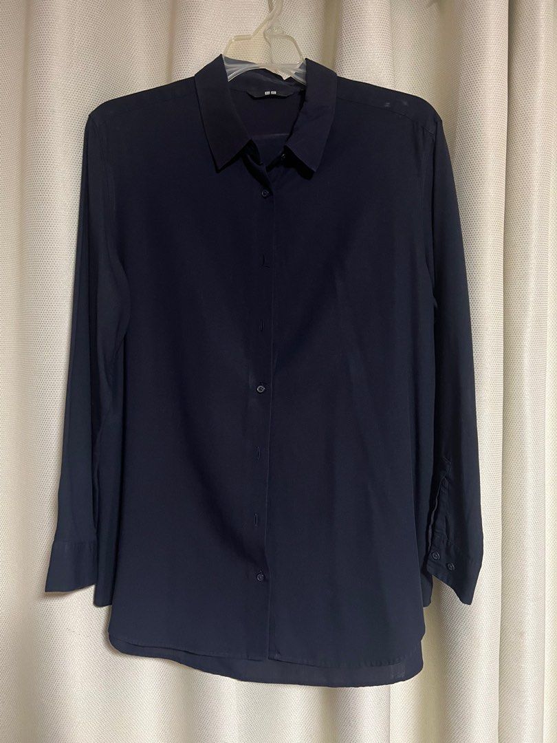 Navy Blue Button-Down (Category: Longsleeves) located in Makati City. Submitted by helpmedeclutter03 (Listing ID 1416275106, Image 1). Description: - Uniqlo size XL - Women’s - Used but no damage - Only issue is semi fading in neck/collar area - Complete buttons.