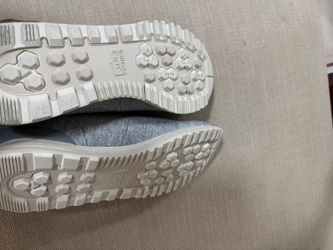 Onitsuka Tiger Sneakers (Category: Sneakers) located in Taguig. Submitted by declutterme12 (Listing ID 1416221786, Image 3). Description: - Onitsuka Tiger sneakers - Grey fabric upper - White sole - Lace-up closure - Brand logo on tongue and sole - Textured sole for grip.