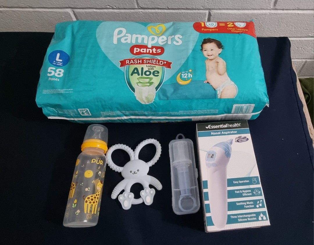 Pampers Pants (Category: Baby Toiletries & Grooming) located in Cavite. Submitted by gpscloset (Listing ID 1416332922, Image 1). Description: Bundle includes Pampers Pants diapers (size L, 58 pieces), a Pur bottle and a medicine dropper. With slightly used teether and nasal aspirator. RFS: Outgrown.
