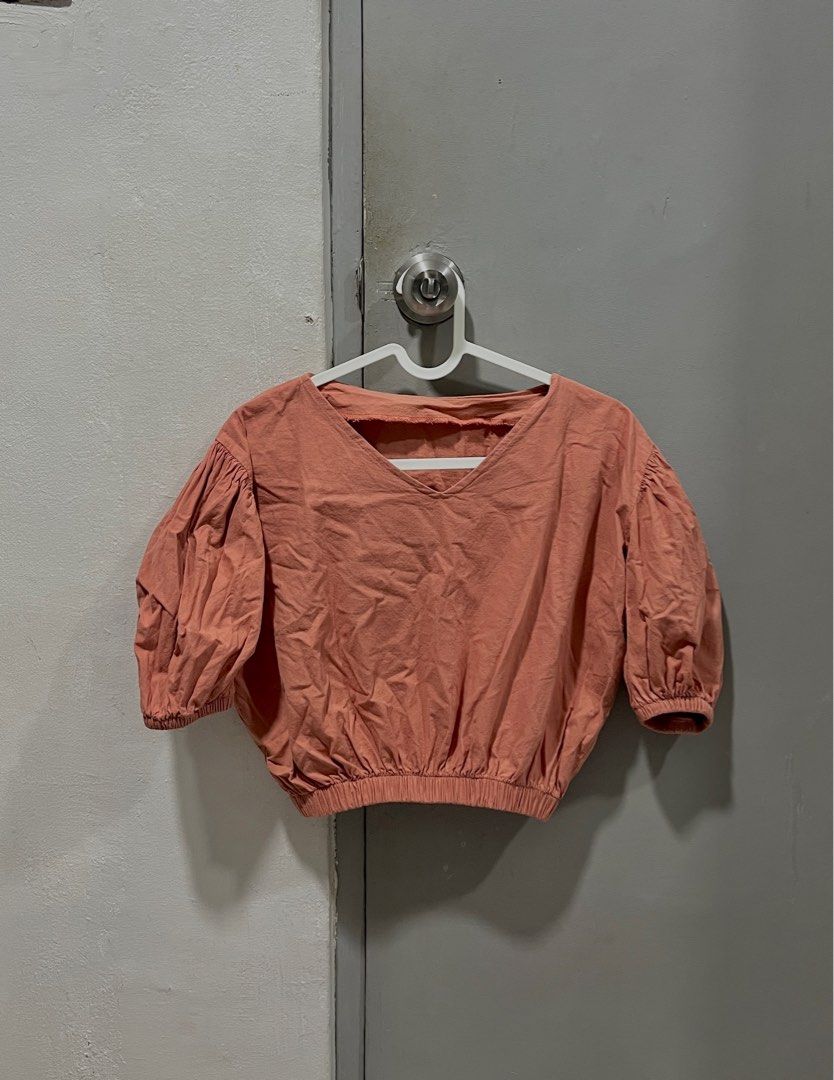 Peach Puff Sleeve Top (Category: Blouses) located in Taguig. Submitted by thriftieth (Listing ID 1416399209, Image 1). Description: - Peach-colored top - V-neckline - Puff sleeves - Elastic hem - Lightweight fabric ✅ negotiable.
