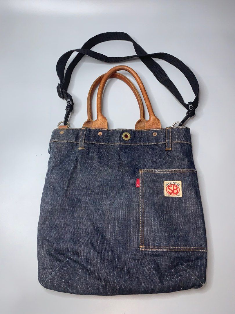 Pherrow's Denim Tote Bag (Category: Sling Bags) located in Binan City. Submitted by disqualified_but_undefeated (Listing ID 1416433659, Image 1). Description: WTS!!! 🔥🔥🔥🔥🔥 Pherrow's Denim Tote Bag Unisex Height- 14" Width-13.5" In Good Condition Replaced original sling 📩📩📩📩 DM me Grab it now! Thanks!!!.