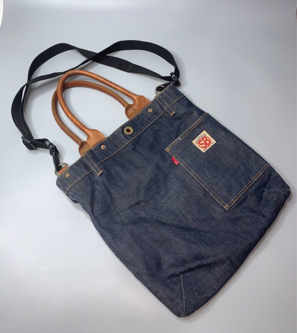 Pherrow's Denim Tote Bag (Category: Sling Bags) located in Binan City. Submitted by disqualified_but_undefeated (Listing ID 1416433659, Image 2). Description: WTS!!! 🔥🔥🔥🔥🔥 Pherrow's Denim Tote Bag Unisex Height- 14" Width-13.5" In Good Condition Replaced original sling 📩📩📩📩 DM me Grab it now! Thanks!!!.
