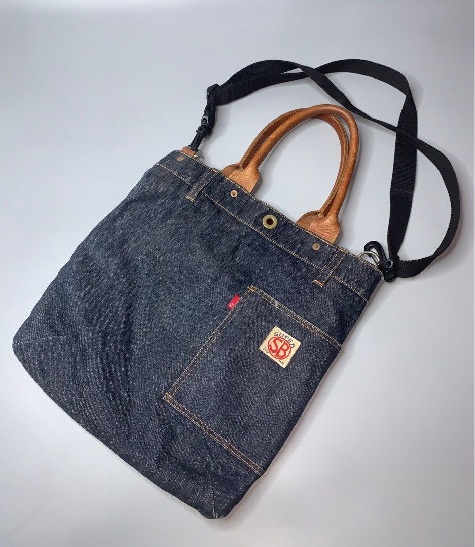 Pherrow's Denim Tote Bag (Category: Sling Bags) located in Binan City. Submitted by disqualified_but_undefeated (Listing ID 1416433659, Image 3). Description: WTS!!! 🔥🔥🔥🔥🔥 Pherrow's Denim Tote Bag Unisex Height- 14" Width-13.5" In Good Condition Replaced original sling 📩📩📩📩 DM me Grab it now! Thanks!!!.