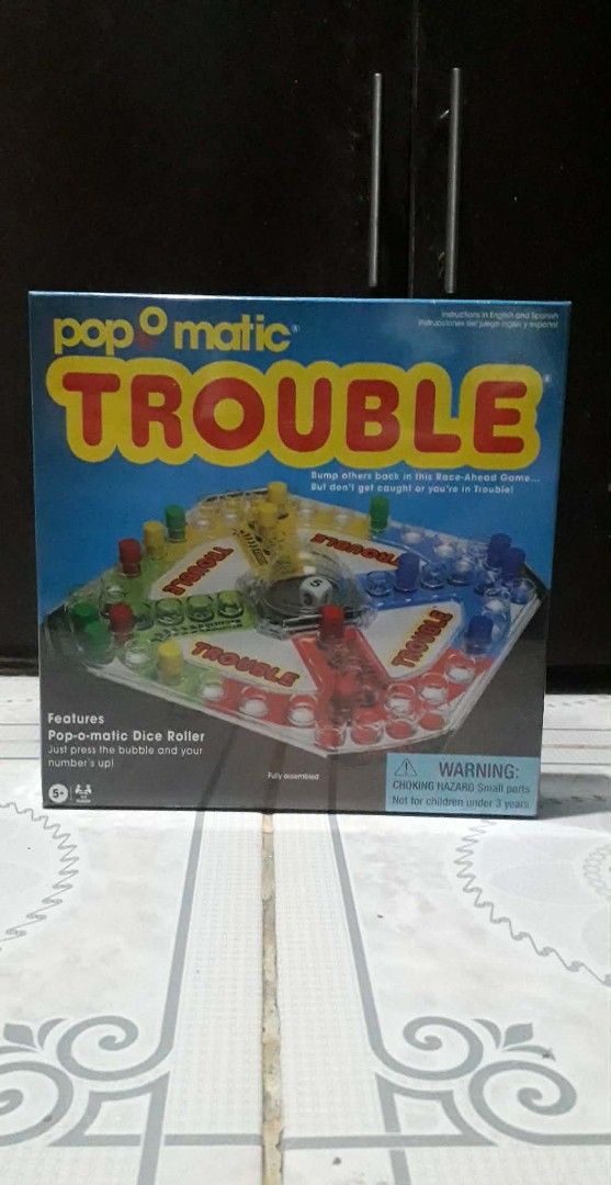 Pop-O-Matic Trouble Board Game (Category: Board Games & Puzzles) located in Binan City. Submitted by ollkorrect (Listing ID 1416382975, Image 1). Description: 🟢 Pop-o-matic Trouble Board Game - Classic race-ahead family game - Features the iconic Pop-o-matic dice roller - Ages 5+, 2–4 players - Brand new, sealed box 💵 Minimum Price: ₱1,200 Antipolo City #BoardGames #FamilyFun #ClassicToys #TroubleGame.