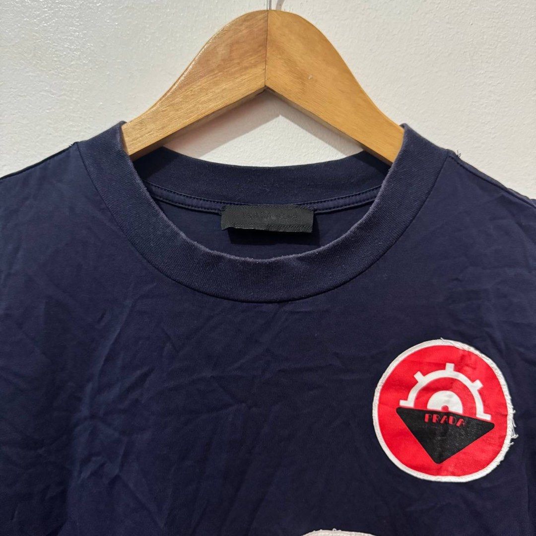 Prada Limited Edition Nautical T-shirt (Category: Luxury Apparel) located in Manila. Submitted by retro.archives (Listing ID 1416394276, Image 2). Description: Prada Limited Edition Nautical T-shirt 📌 Size: M ti L Dimes: 21"x28" Condition: 8.5/10 Issue: Mini Pinhole not visible 🧷 Price: 700 📍 Angeles City, Pampanga 🚛 Courier – J&T (Regular Shipping).