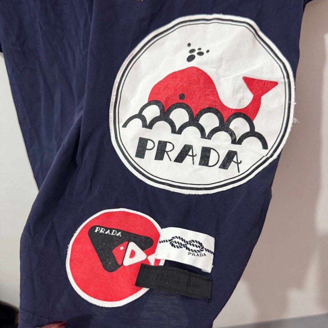 Prada Limited Edition Nautical T-shirt (Category: Luxury Apparel) located in Manila. Submitted by retro.archives (Listing ID 1416394276, Image 3). Description: Prada Limited Edition Nautical T-shirt 📌 Size: M ti L Dimes: 21"x28" Condition: 8.5/10 Issue: Mini Pinhole not visible 🧷 Price: 700 📍 Angeles City, Pampanga 🚛 Courier – J&T (Regular Shipping).
