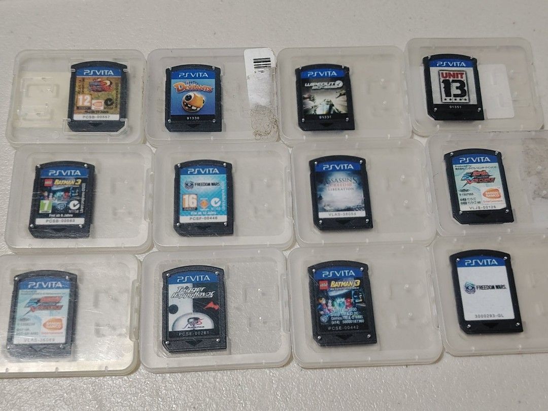 PS Vita Games Cartridges (Category: PlayStation) located in Manila. Submitted by lemsgadgetszone (Listing ID 1416277356, Image 2). Description: - PS Vita game cartridge collection - Titles include: Rayman, Need for Speed, Mortal Kombat, Lego, Final Fantasy X, Soul Sacrifice, and more - Games are in individual cases - Some games include original cases - Includes 16GB and 8GB PS Vita memory cards.