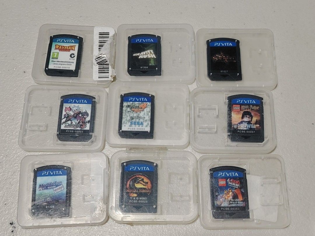 PS Vita Games Cartridges (Category: PlayStation) located in Manila. Submitted by lemsgadgetszone (Listing ID 1416277356, Image 1). Description: - PS Vita game cartridge collection - Titles include: Rayman, Need for Speed, Mortal Kombat, Lego, Final Fantasy X, Soul Sacrifice, and more - Games are in individual cases - Some games include original cases - Includes 16GB and 8GB PS Vita memory cards.