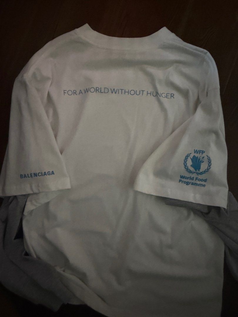 Pullover (Category: Tshirts & Polo Shirts) located in Singapore. Submitted by dtkddtkd (Listing ID 1416310459, Image 3). Description: Bever worn before, authentic. Left in cupboard for too long and nv wear, some sights of spots but can be washed off. Grab express on me for serious buyers, instant block for spastic questions. Sold as it is, u want to meadure up down left right then go boutique..