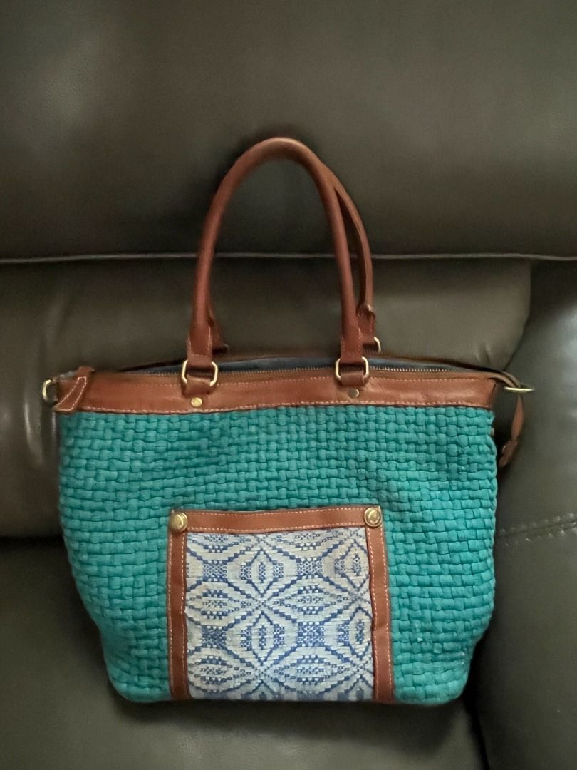 Rags2Riches R2R Maria Bag (Category: Shoulder Bags) located in Marikina City. Submitted by declutteringaccount__ (Listing ID 1416309231, Image 1). Description: Rags2Riches Maria Bag From an old collection way way back in 2017 Teal exterior woven Genuine leather handles and accents in brown Comes with an extra long genuine leather strap in brown Gently used with some signs of previous ownership, does not affect functionality or overall look Unique