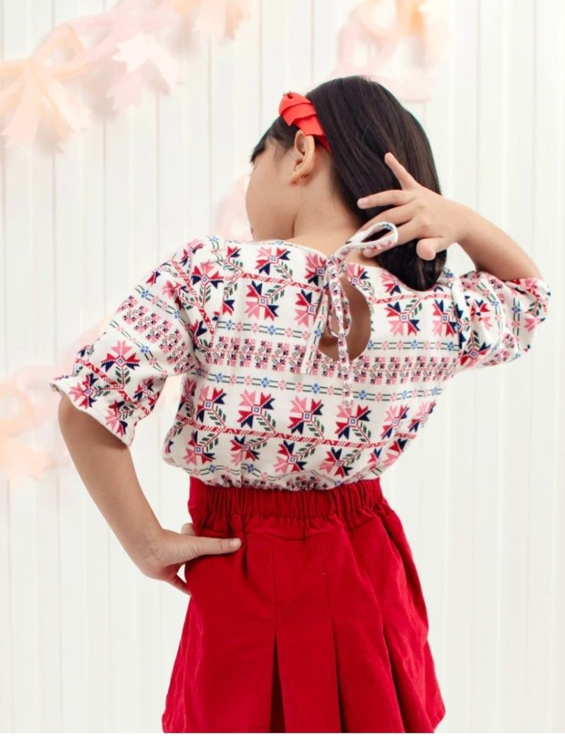 Rainbowstitches Red Skirt and Top Set (Category: Sets or Coordinates) located in Victoria. Submitted by reignf027 (Listing ID 1416398130, Image 2). Description: - Rainbowstitches set for children - Includes a red pleated skirt - Features a patterned top with short sleeves - Unique back design on the top - Perfect for special occasions or everyday wear -Size 7 -used once pinang christmas party lang -super comfy -100% Cotton .