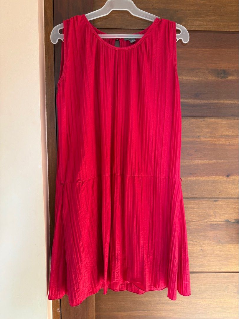 Red Pleated Sleeveless Dress (Category: Dresses) located in Antipolo. Submitted by reeanaaa_ (Listing ID 1416307189, Image 1). Description: - Sleeveless red dress - Pleated design - Round neckline with keyhole back - Lightweight fabric - Simple, elegant silhouette.