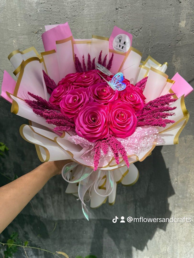 Satin Flower Bouquet (Category: Flowers & Bouquets) located in Valenzuela. Submitted by mflowers_crafts (Listing ID 1416235757, Image 3). Description: half dozen - 599 1 dozen - 1200 Valentine’s Day bouquets now available ❤️ Handcrafted with satin ribbons and fuzzy wires, finished with dried trigo fillers 🌾💐 Perfect for a love that lasts. Surprise them with a bouquet that defies time. Perfect for showing someone you care, forever.. #SatinFlower