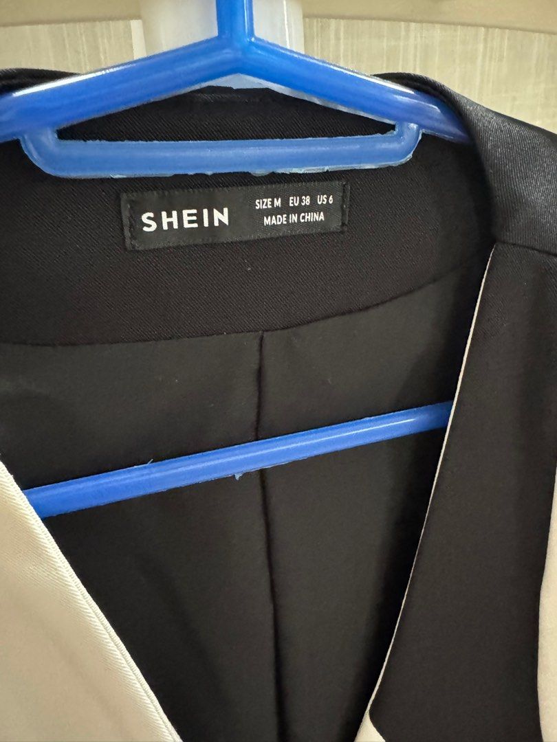 SHEIN Black and White Vest (Category: Sleeveless) located in Tarlac. Submitted by abromo (Listing ID 1416241117, Image 2). Description: - SHEIN vest - Black and white color block design - V-neckline - Three buttons - Two front pockets - Size: M (EU 38, US 6) - Made in China.