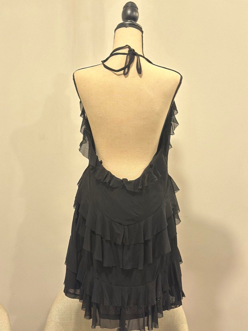 Shein Curve Halter Ruffle Dress (Category: Dresses) located in Makati City. Submitted by onthegridddd (Listing ID 1416348505, Image 3). Description: - Shein Curve black halter dress - Size: 1XL - Features: Tiered ruffle design, low back - Material: Polyamide and elastane blend - Perfect for: Night out, special occasion - USED ONCE.