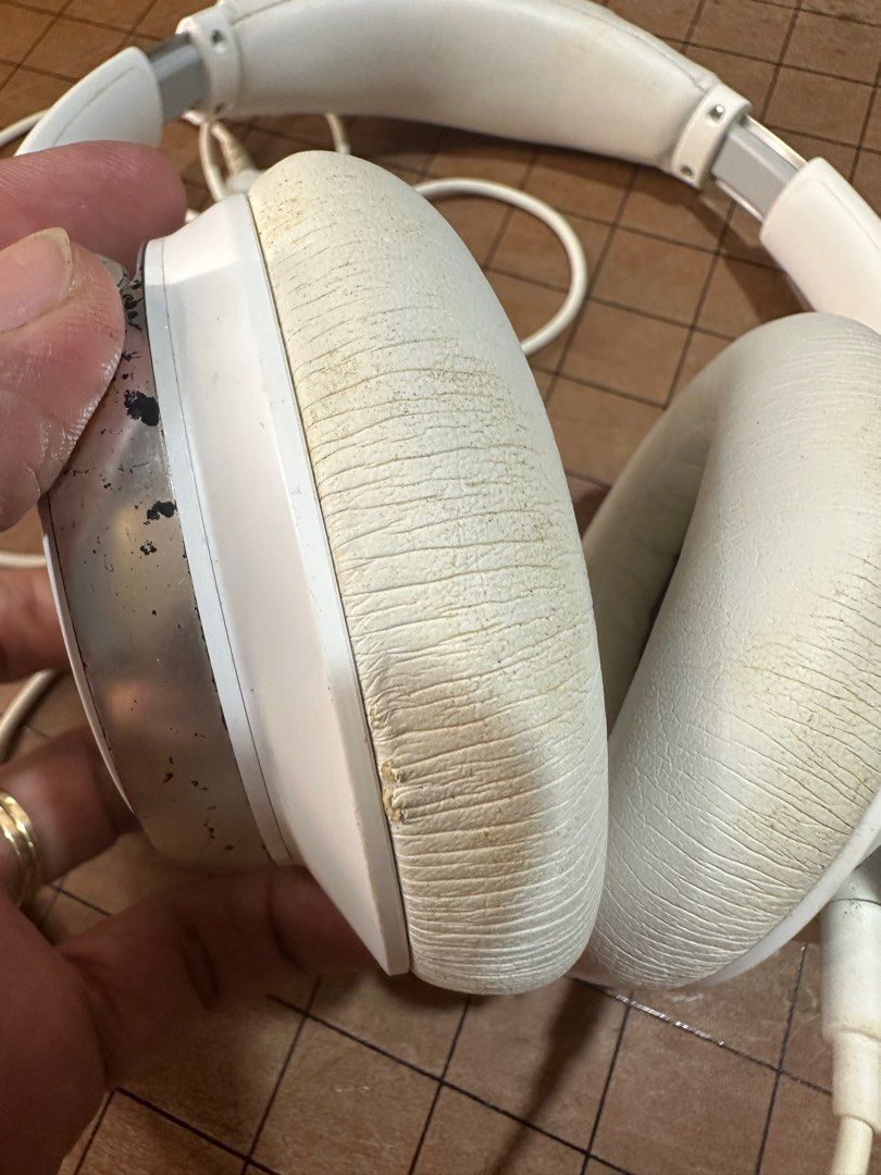 Sony MDR-10R Headphones (Category: Headphones & Headsets) located in Rodriguez. Submitted by pwestoonlinestore (Listing ID 1416346305, Image 3). Description: - White Sony MDR-10R headphones - Wired connection - White earcups and headband - Visible wear and discoloration on earcups - Model number visible - Made in Malaysia.