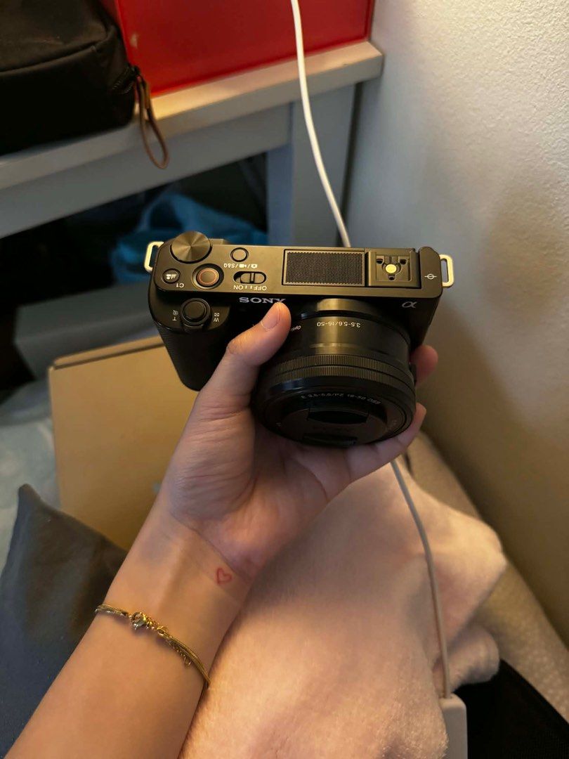 Sony ZV-E10 (Category: Cameras) located in Rizal. Submitted by declutter_with_d (Listing ID 1416301374, Image 2). Description: ZV - E10 36k Mint Condition No scratches/Dents 5k+ Shutter Count Only Inclusions •Box •Free furry Mic •Sony ZV-E10 Body •Sony 16-50 OSS lens •Sony camera strap •Sony Cord •1 Original Sony Battery •2 smallrig battery with charger •Godox iM30 Flash •Body Cap + Lens Cap •Silicon Case Cainta, Rizal Location 33k if without •1 
