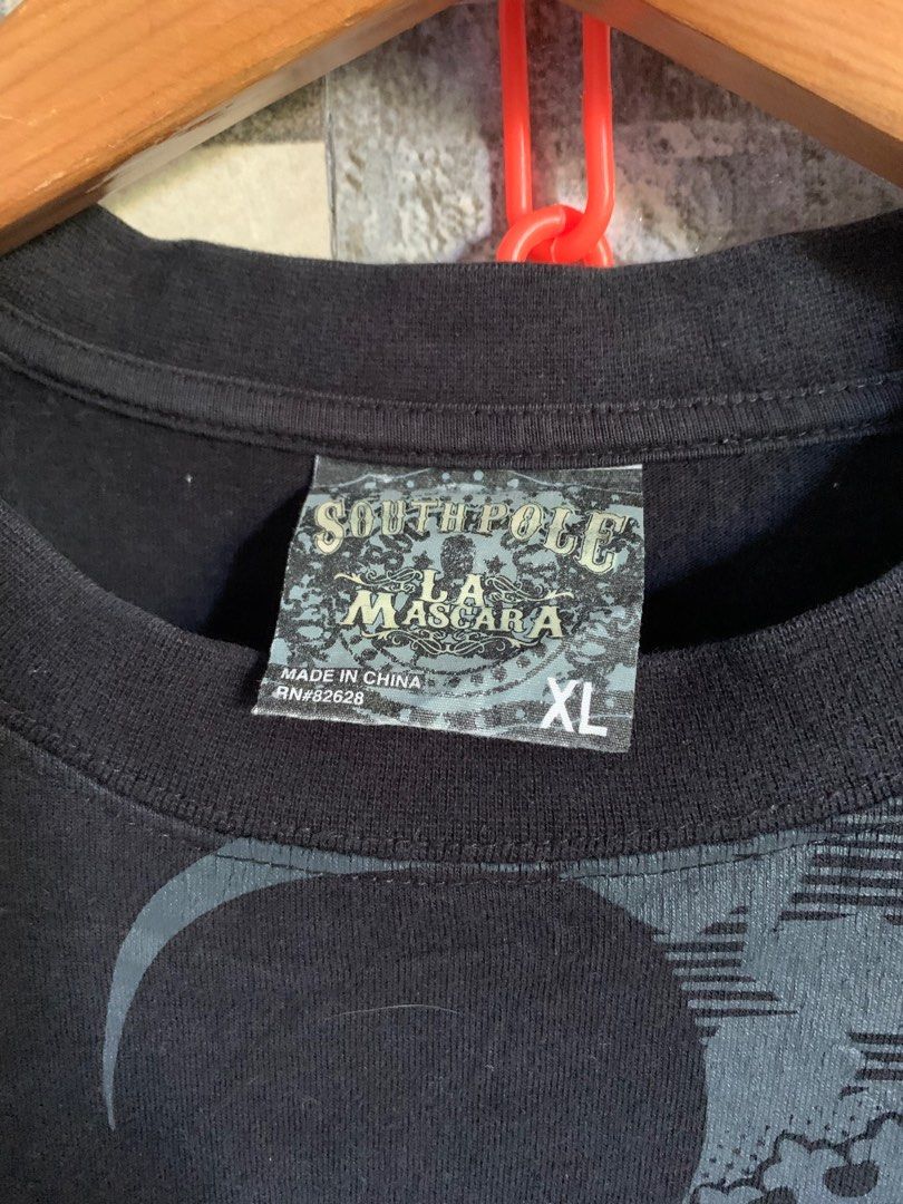 SouthPole La Masacara Y2k Shirt (Category: Tshirts & Polo Shirts ) located in Cagayan de Oro. Submitted by densho69 (Listing ID 1416372011, Image 2). Description: Dimes: 24 x 32 (XL on tag, fit XL) Color: 8.5/10 Condition: 8.8/10 Issue: Need wash, slight hairline.