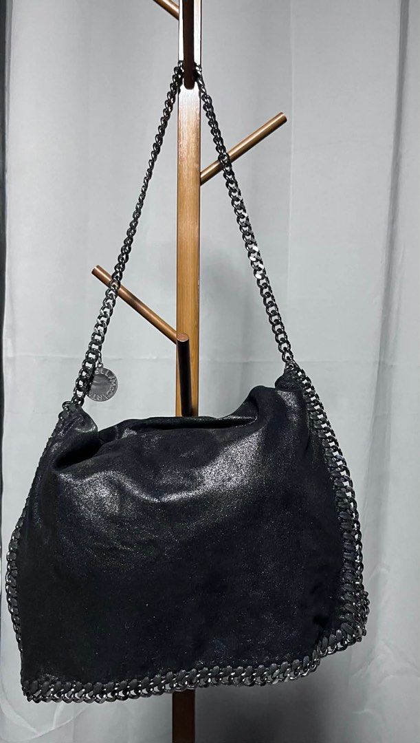 Stella McCartney Falabella - Medium Black Bag (Category: Luxury Bags & Wallets) located in Quezon City. Submitted by carmeladelacruz82 (Listing ID 1416411192, Image 1). Description: - AUTHENTIC Stella McCartney Falabella Medium Black Bag - Bag only (no dust bag) - Condition: no major flaws - Issue: just a stain inside the bag (see last pictures) .