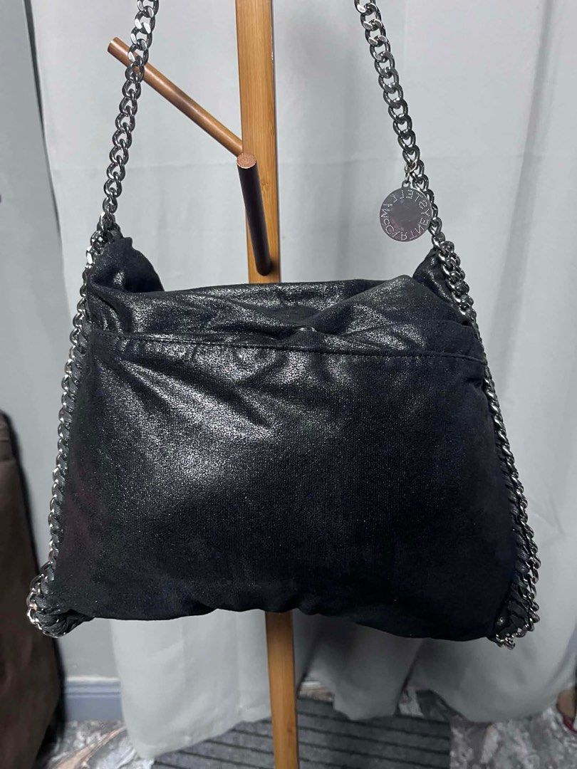 Stella McCartney Falabella - Medium Black Bag (Category: Luxury Bags & Wallets) located in Quezon City. Submitted by carmeladelacruz82 (Listing ID 1416411192, Image 2). Description: - AUTHENTIC Stella McCartney Falabella Medium Black Bag - Bag only (no dust bag) - Condition: no major flaws - Issue: just a stain inside the bag (see last pictures) .
