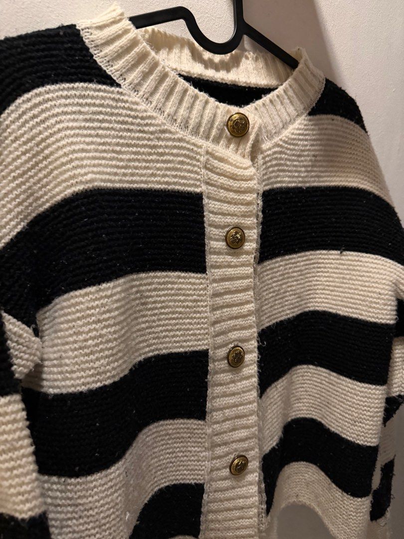Striped Cardigan with Gold Buttons (Category: Coats, Jackets and Outerwear) located in Pasig City. Submitted by lovedstuff2020 (Listing ID 1416408050, Image 2). Description: - Black and white striped design - Round neckline - Gold-colored button closure - Long sleeves - Knitted material - Easy to pair with different outfits.