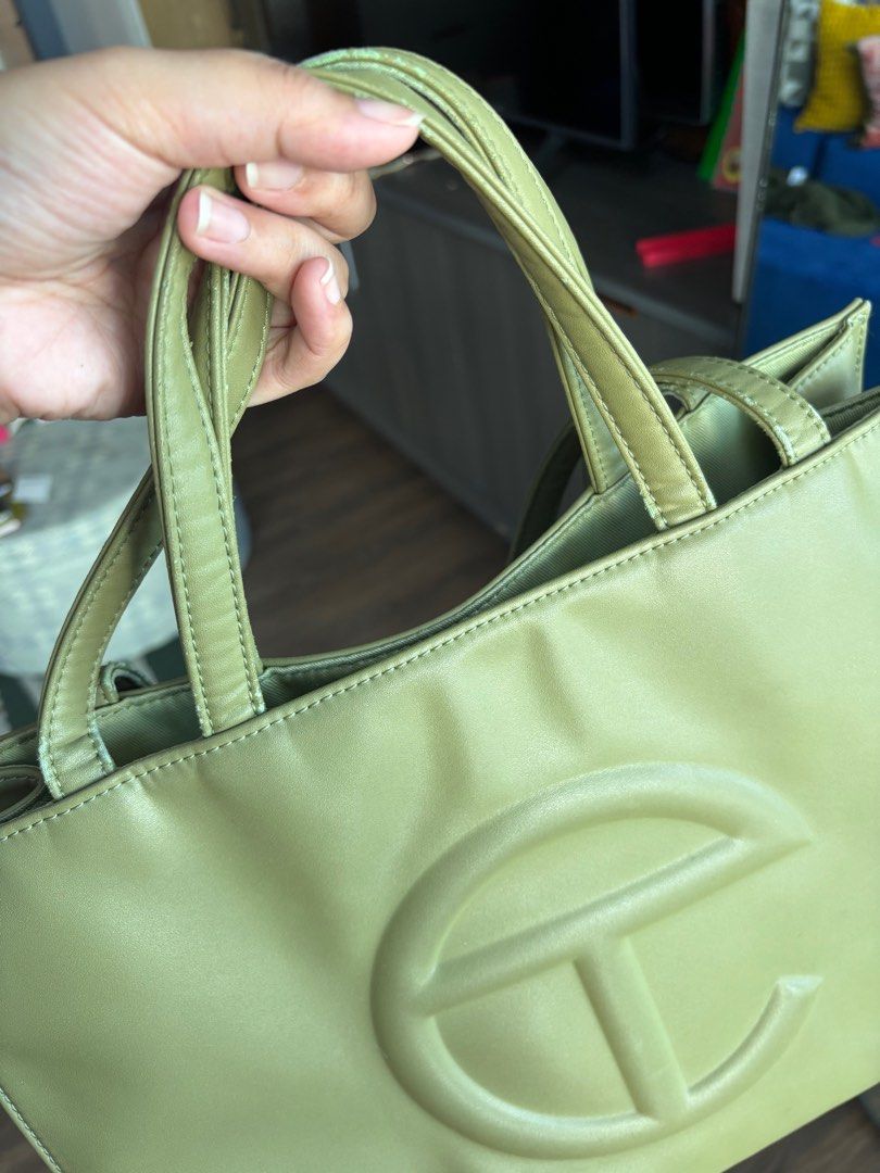 Telfar Shopping Bag - Medium (Category: Luxury Bags & Wallets) located in Taguig. Submitted by ij_dh (Listing ID 1416432020, Image 2). Description: Telfar Sage Green - orig price 14k-16k - ordered from site - w/ receipt - super well used/loved - rfs: replacing my work bag .