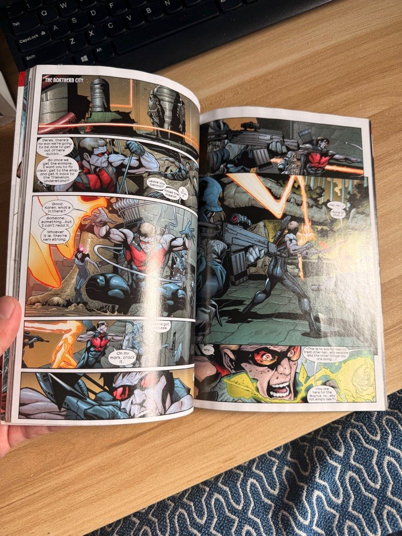Ultimate Comics Hawkeye (Category: Comics & Manga) located in Manila. Submitted by godallan672142 (Listing ID 1416256374, Image 3). Description: - Ultimate Comics Hawkeye graphic novel - Published by Marvel - Features Hawkeye on the cover - Includes a story description on the back - Contains colorful illustrations.