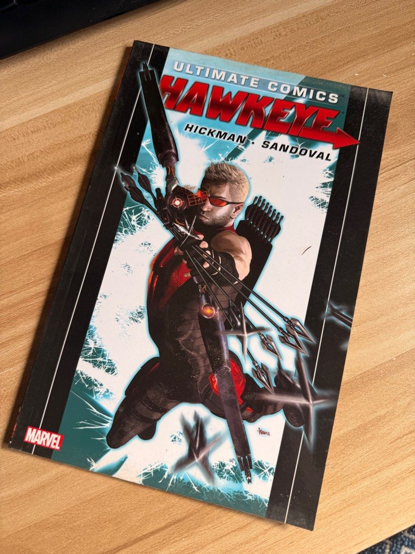 Ultimate Comics Hawkeye (Category: Comics & Manga) located in Manila. Submitted by godallan672142 (Listing ID 1416256374, Image 1). Description: - Ultimate Comics Hawkeye graphic novel - Published by Marvel - Features Hawkeye on the cover - Includes a story description on the back - Contains colorful illustrations.