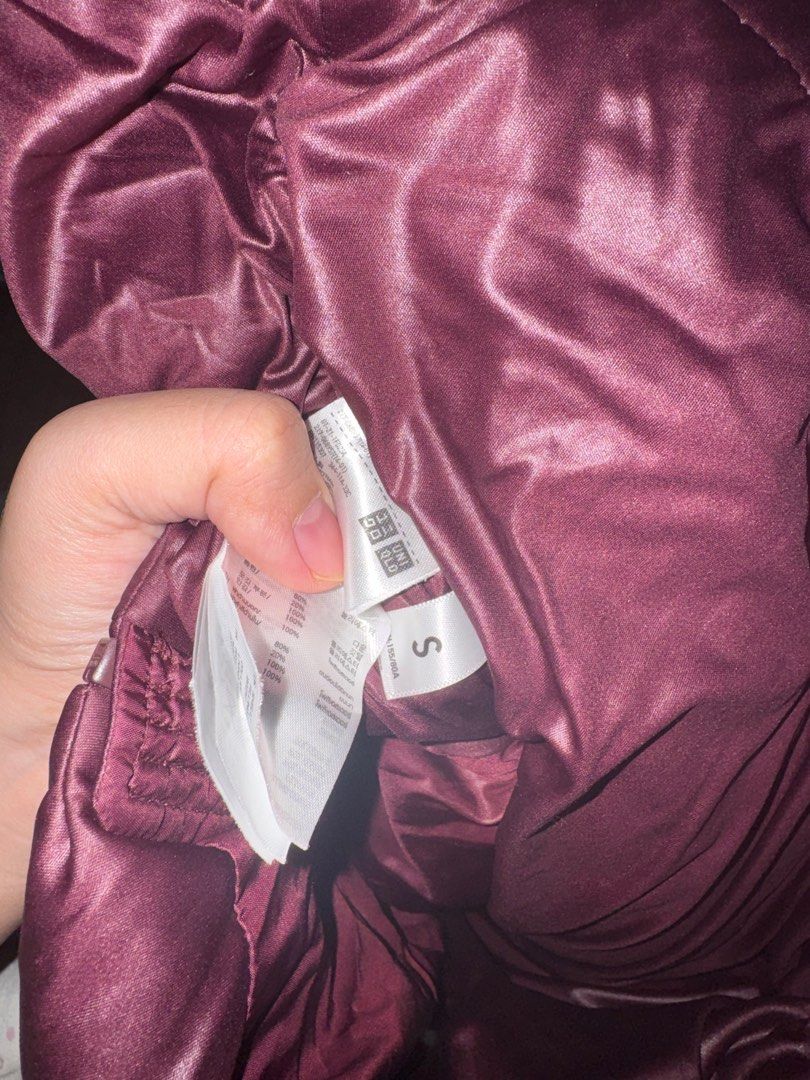 Uniqlo Puffer Jacket - Burgundy (Category: Coats, Jackets and Outerwear) located in Rizal. Submitted by igarette (Listing ID 1416428104, Image 3). Description: - Uniqlo Puffer Jacket - Rich burgundy color - Size: Small - Full zipper closure - High collar - Material: Polyester and Down - Comes with detachable hoodie.