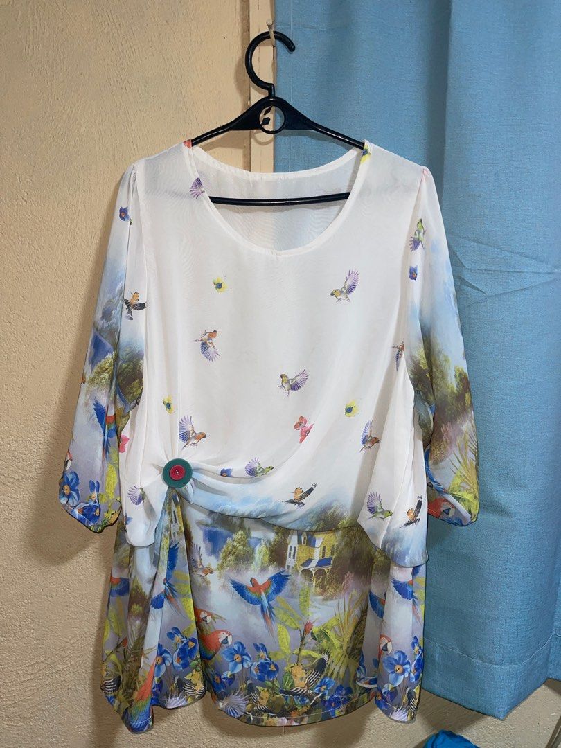 Vintage Printed Blouse with Bird Design (Category: Blouses) located in Quezon City. Submitted by ___maris03 (Listing ID 1416402125, Image 1). Description: - Unique bird print design - Round neckline - Three-quarter sleeves - Button detail on the side - Lightweight fabric - Ideal for warm weather.