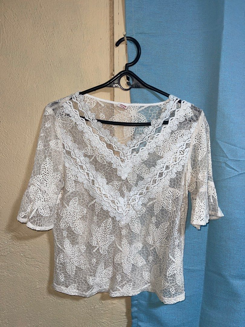 Vintage White Lace Top Small to Medium Size (Category: Blouses) located in Quezon City. Submitted by ___maris03 (Listing ID 1416400679, Image 1). Description: - White lace top - V-neck design - Short, flared sleeves - Intricate floral lace pattern - Perfect for layering - Suitable for various occasions.