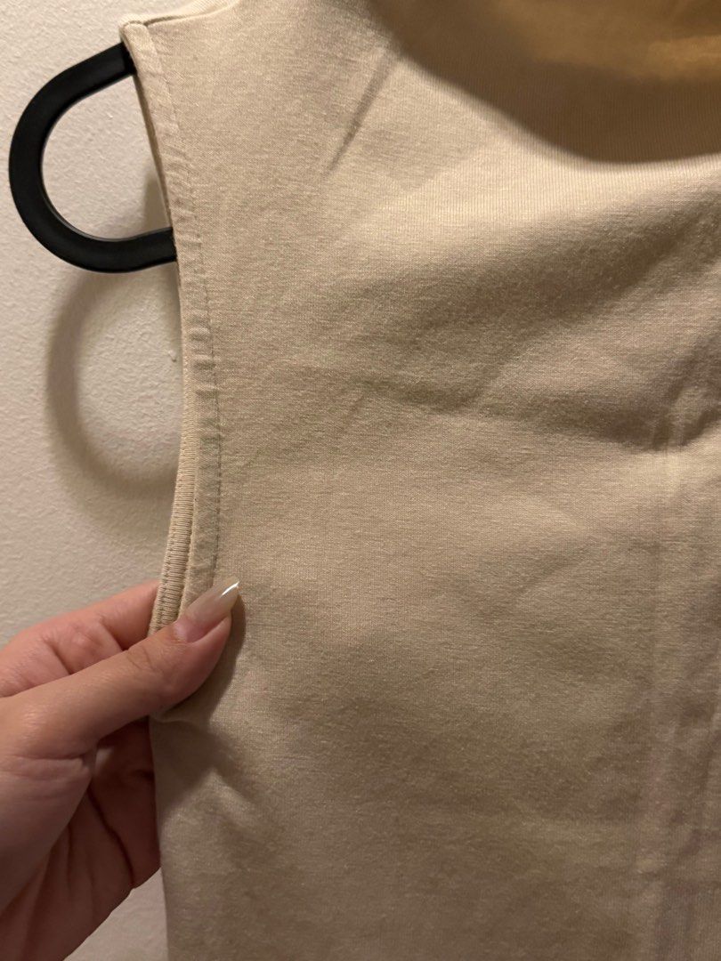 Zara Sleeveless Top (Category: Sleeveless) located in Pasig City. Submitted by lovedstuff2020 (Listing ID 1416410009, Image 2). Description: - Zara sleeveless top - Neutral beige color - Mock neck design - Size S - Made in Bangladesh - Versatile and easy to style.