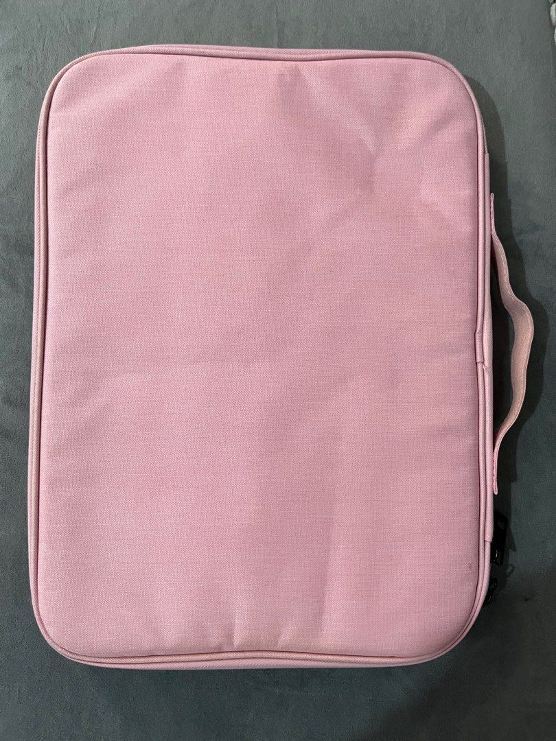 13-inch laptop sleeve (Category: Laptop Bags & Sleeves) located in Quezon City. Submitted by jnapreloved (Listing ID 1416518677, Image 2). Description: Pink laptop sleeve for 13-inch laptop Like new Multiple compartments With handle RFS: extra Loc: Cubao near Gateway.