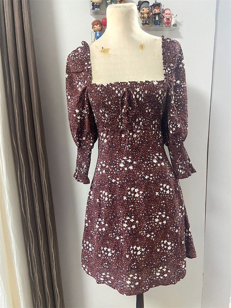 Aiv Floral Mini Dress - Size S (Category: Dresses) located in Angeles City. Submitted by BORAHAE (Listing ID 1416468351, Image 1). Description: - Aiv mini dress - Size: S - Brown floral print with white accents - Square neckline - Smocked bodice - Three-quarter sleeves with elastic cuffs - Made in China.