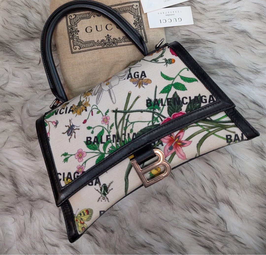 Authentic Balenciaga x Gucci Hacker Project Flora bag (Category: Luxury Bags & Wallets) located in Rizal. Submitted by SummerPeaCloset (Listing ID 1416630641, Image 1). Description: Authentic Balenciaga x Gucci Hacker Project Flora Bag With long strap and original dustbag In good condition Rarely used .