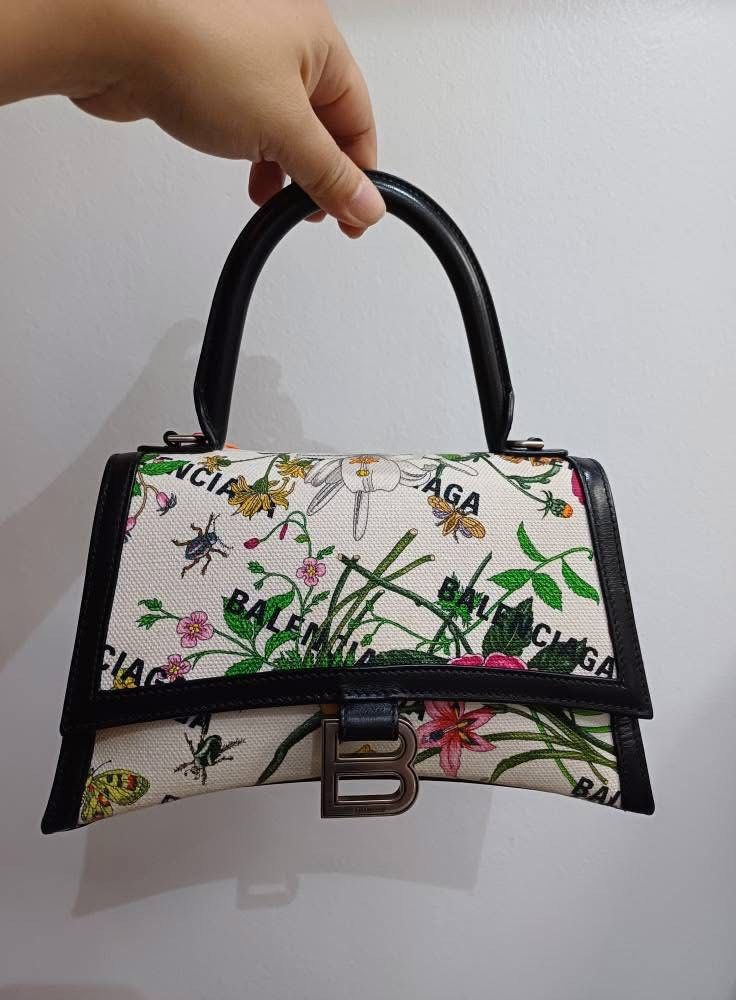 Authentic Balenciaga x Gucci Hacker Project Flora bag (Category: Luxury Bags & Wallets) located in Rizal. Submitted by SummerPeaCloset (Listing ID 1416630641, Image 2). Description: Authentic Balenciaga x Gucci Hacker Project Flora Bag With long strap and original dustbag In good condition Rarely used .