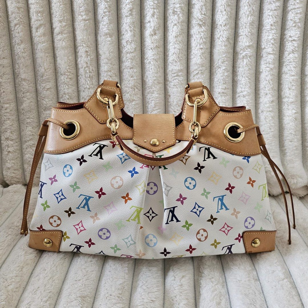 Authentic Louis Vuitton Monogram Multicolore (Murakami) Ursula Bag (Category: Luxury Bags & Wallets) located in Rizal. Submitted by SummerPeaCloset (Listing ID 1416631138, Image 2). Description: Authentic Louis Vuitton Monogram Multicolore (Murakami) Ursula Bag With original dustbag With tiny mark as shown on the 5th photo.