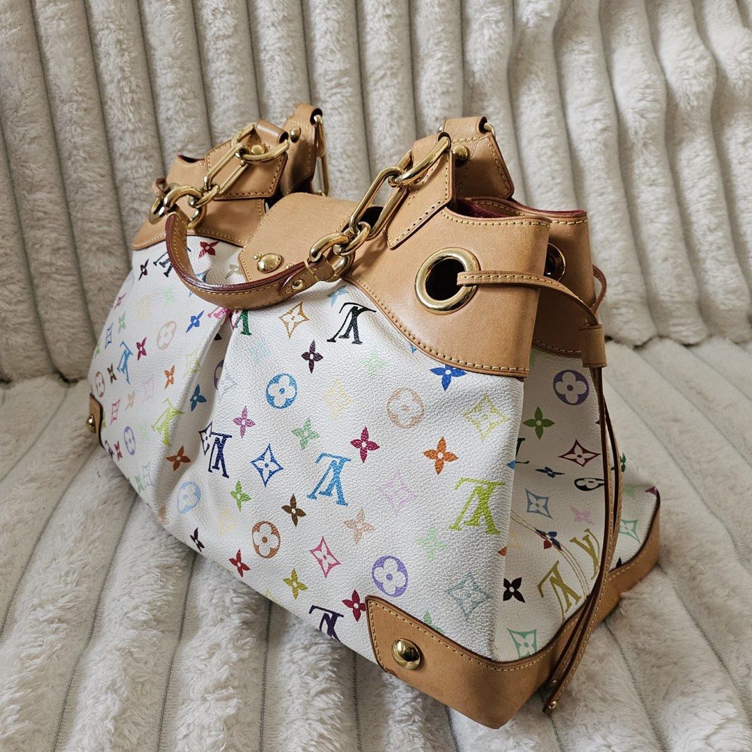 Authentic Louis Vuitton Monogram Multicolore (Murakami) Ursula Bag (Category: Luxury Bags & Wallets) located in Rizal. Submitted by SummerPeaCloset (Listing ID 1416631138, Image 3). Description: Authentic Louis Vuitton Monogram Multicolore (Murakami) Ursula Bag With original dustbag With tiny mark as shown on the 5th photo.