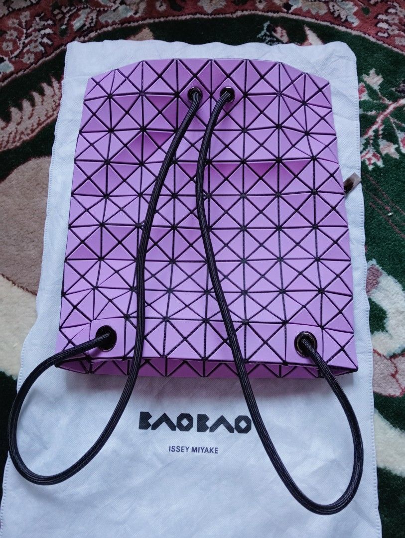 Bao Bao Issey Miyake Geometric Backpack Bag (Category: Luxury Bags & Wallets) located in Baguio. Submitted by cleverlion_e92944 (Listing ID 1416443862, Image 3). Description: - Authentic Bao Bao Issey Miyake backpack bag - Light purple color with black accents - Drawstring closure - Zippered interior pocket - Includes dust bag - Black interior - Zipper pull with Bao Bao logo - Unique geometric design.