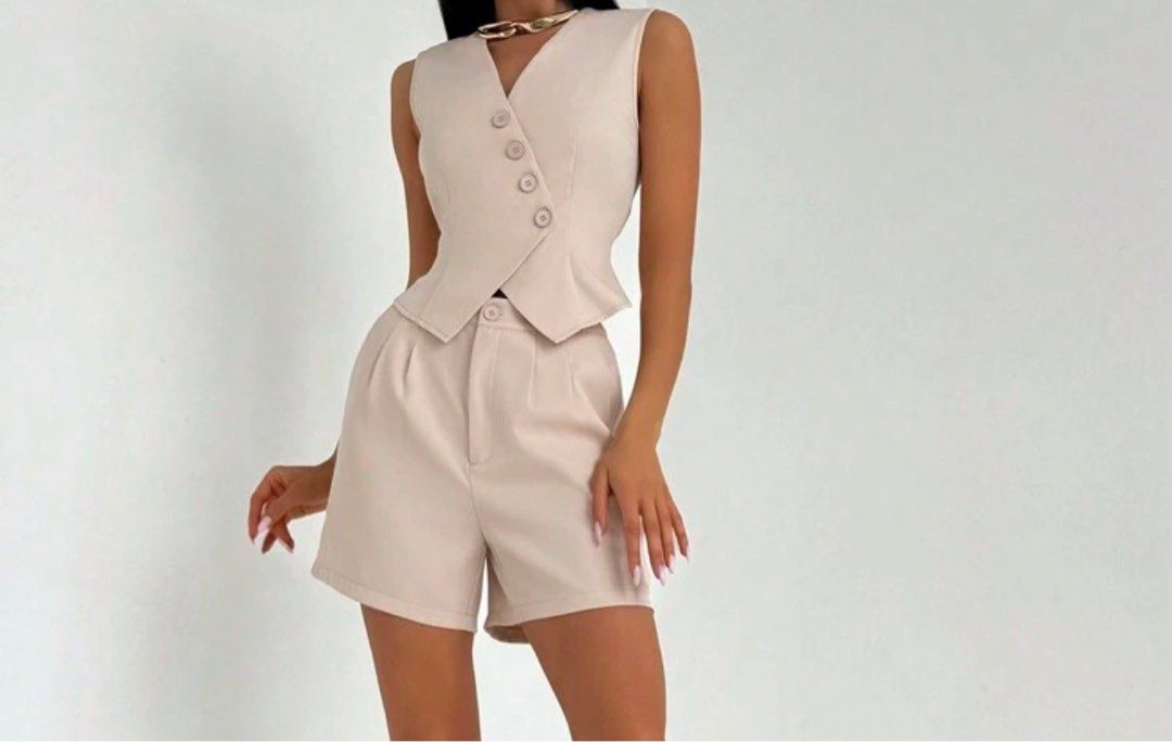 Beige Vest and Shorts Set Coordinates Terno (Category: Sets or Coordinates) located in Manila. Submitted by xuchesca (Listing ID 1416459532, Image 1). Description: - Beige vest and shorts set - Vest: V-neck, button closure - Shorts: High-waisted - Perfect for a chic look - Suitable for casual and semi-formal events - Versatile wardrobe addition fits S-M Payment through Gcash/ Bank Transfer .