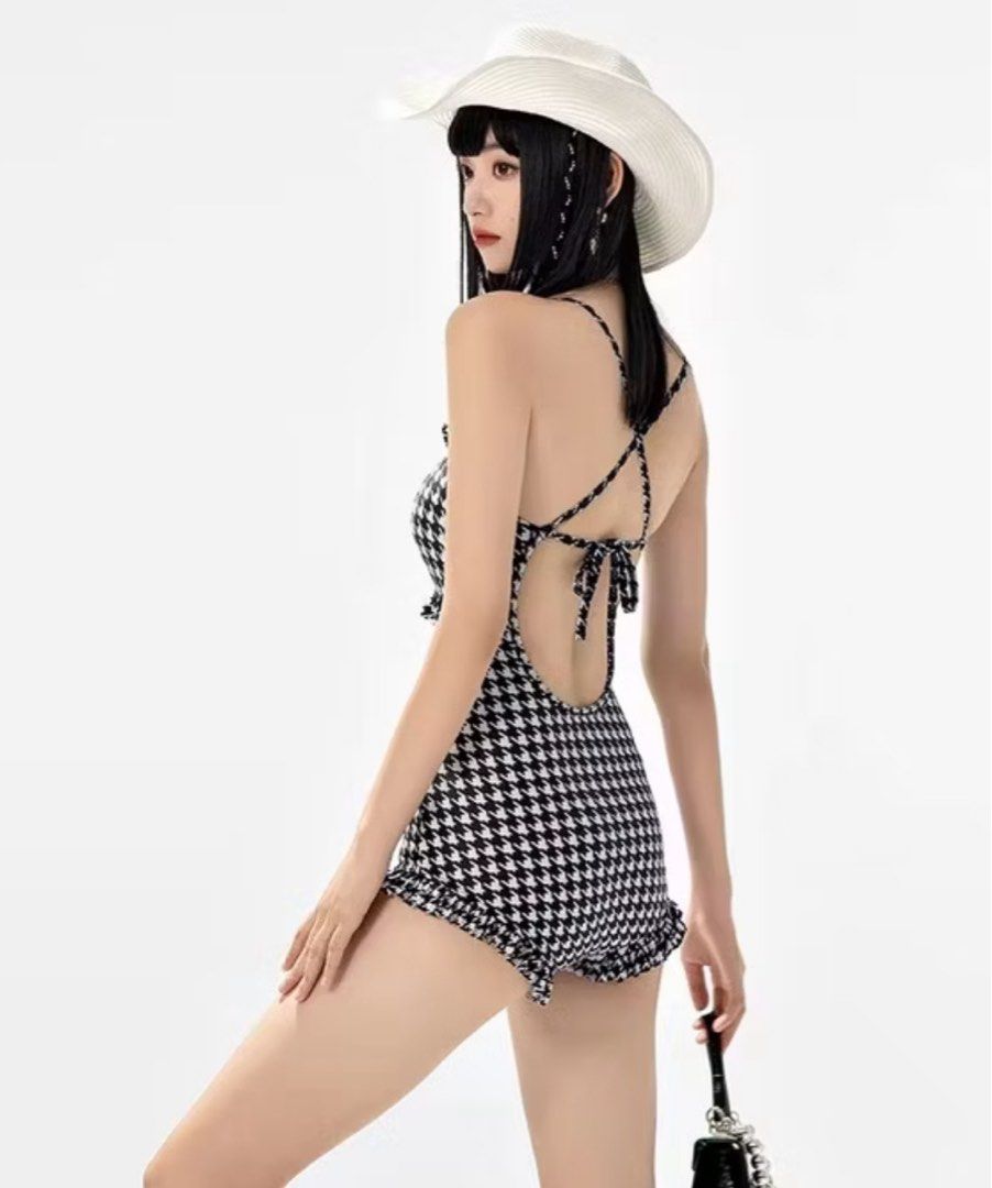 black and white one-piece swimsuit (Category: Bikinis & Swimsuits) located in Manila. Submitted by swantj (Listing ID 1416496359, Image 2). Description: size: free size can fit small frame to large weight: 42 kg to 60 kg height: 4'11 to 5'7 adjustable stretchable.