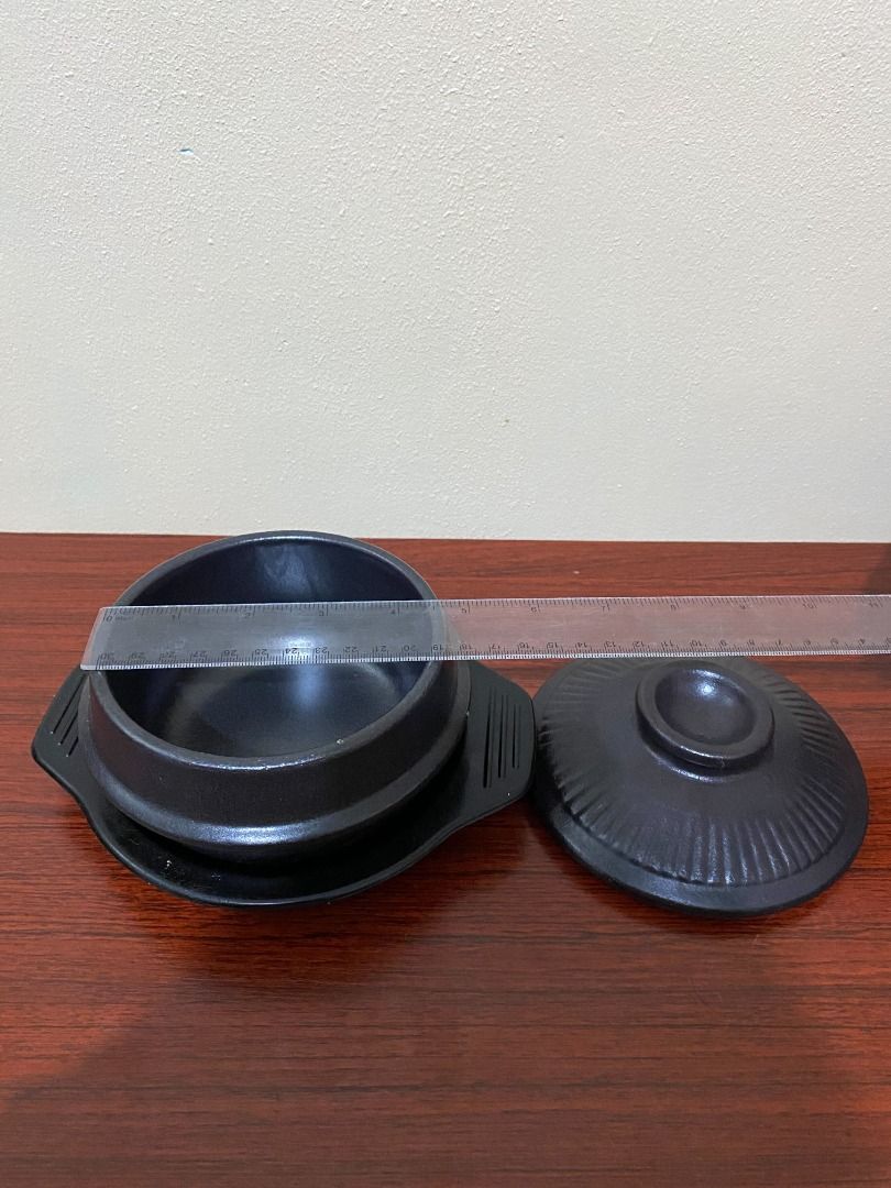 Black Ceramic Clay Hot Pot (Category: Cookware & Accessories) located in Taguig. Submitted by rudelynamo62091 (Listing ID 1416573203, Image 2). Description: Black ceramic casserole dish with lid and stand. Medium size, textured exterior. Perfect for individual servings of stews, soups, or rice. Used once, please message me if you’d like additional photos or images. .
