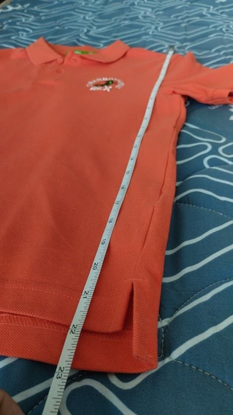 Bossini Orange T-Rex Polo Shirt (Category: Babies & Kids Fashion) located in Caloocan City. Submitted by chris_mill (Listing ID 1416466191, Image 3). Description: - Orange polo shirt - size 150.