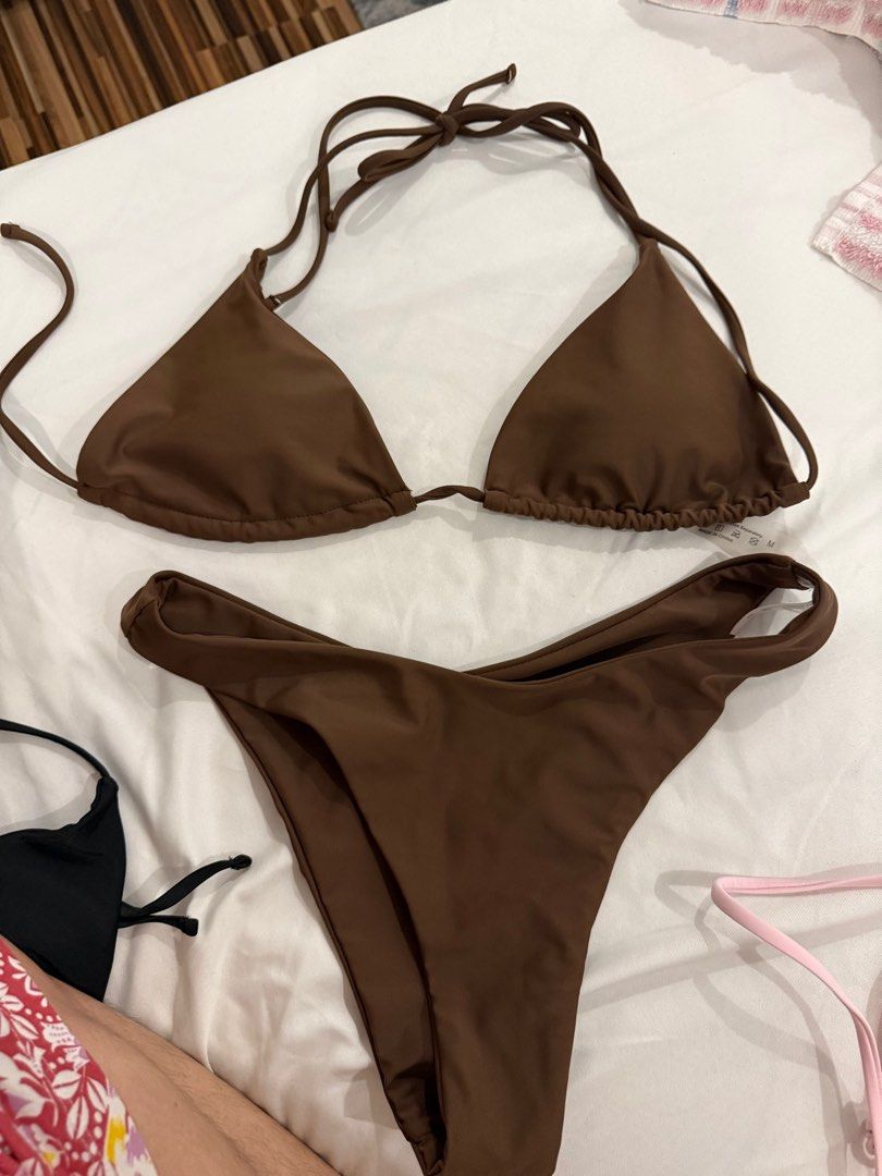 Brown Triangle Bikini Set (Category: Bikinis & Swimsuits) located in Manila. Submitted by _cdn27 (Listing ID 1416536215, Image 1). Description: - Brown triangle bikini set - Adjustable top straps - High-cut bottoms - Solid brown color - Smooth material (possibly nylon/spandex) - fits small-medium .