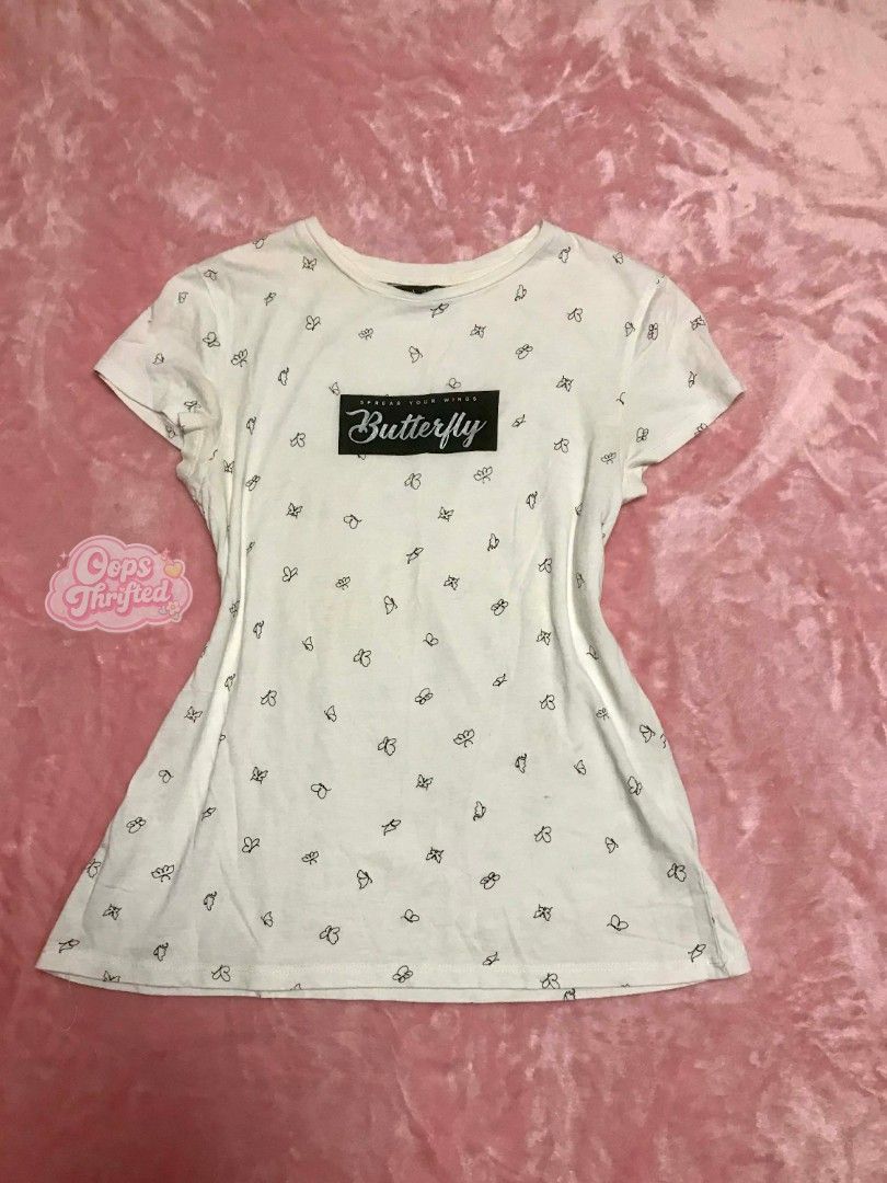 Butterfly Print White T-shirt (Category: Shirts) located in Cebu City. Submitted by alwayssecondoption (Listing ID 1416524360, Image 1). Description: Pre-owned item from my personal wardrobe (not thrifted/ukay). Well taken care of, in good condition. RFS: Decluttering.