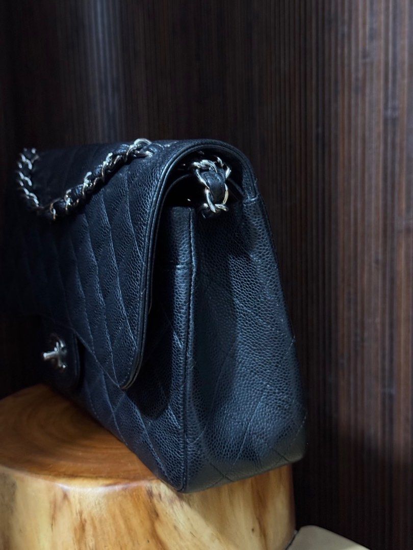 Chanel Jumbo Flap (Category: Luxury Bags & Wallets) located in Quezon City. Submitted by mariagrey (Listing ID 1416578062, Image 3). Description: Chanel Jumbo Flap, Caviar SHW, No foul smell, Corner wears, Hairlines on hardware, Wears on back pocket Inclusions Authenticit card, Box, Dustbag Product Code 203***36 Legit Grails Authenticated Meet up or shipping.