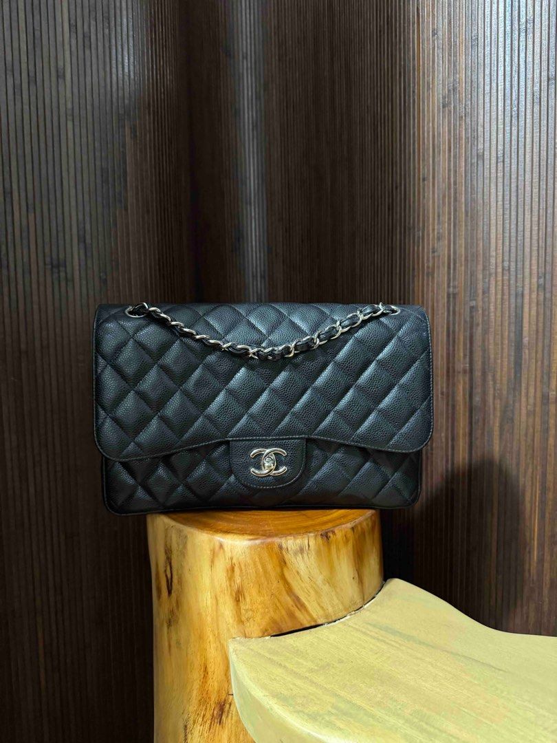 Chanel Jumbo Flap (Category: Luxury Bags & Wallets) located in Quezon City. Submitted by mariagrey (Listing ID 1416578062, Image 1). Description: Chanel Jumbo Flap, Caviar SHW, No foul smell, Corner wears, Hairlines on hardware, Wears on back pocket Inclusions Authenticit card, Box, Dustbag Product Code 203***36 Legit Grails Authenticated Meet up or shipping.