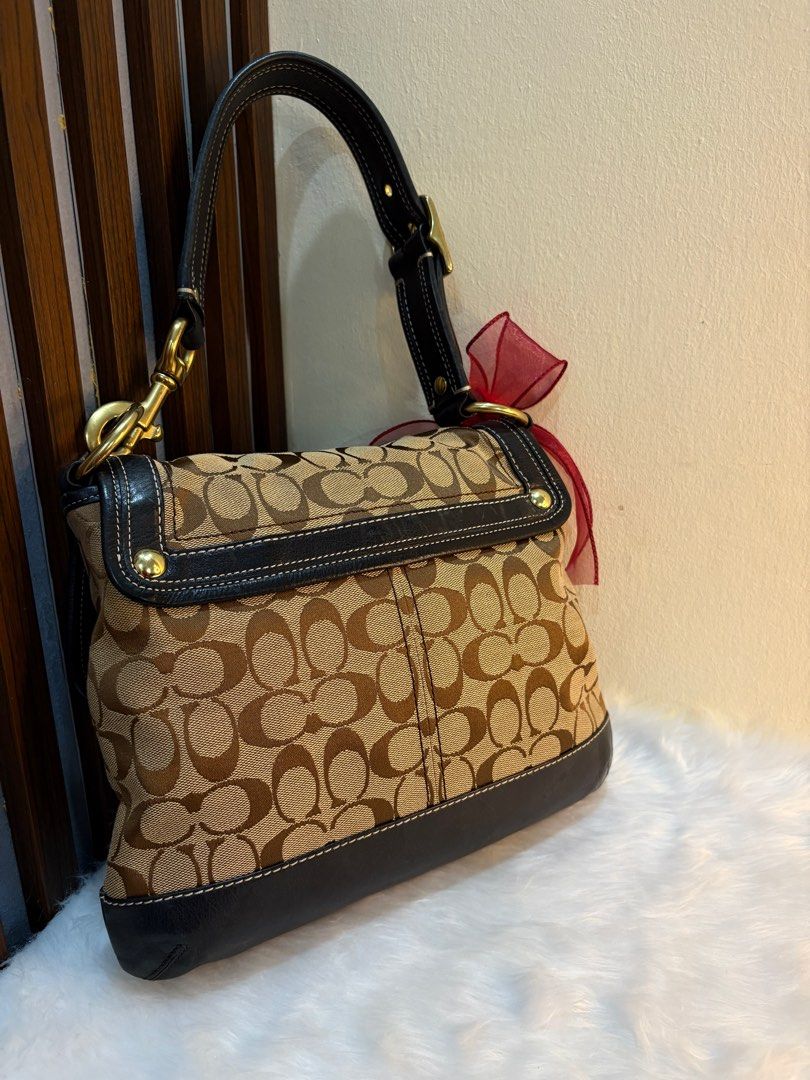 SOLD Coach Legacy Turnlock Shoulder Bag (Category: Other Accessories) located in San Fernando. Submitted by srhgrc (Listing ID 1416470414, Image 2). Description: -open for layaway -rank a condition -canvas 10/10 -leather 10/10 -hardwares 9/10 - slight scratch sa turnlock -super pretty in actual .