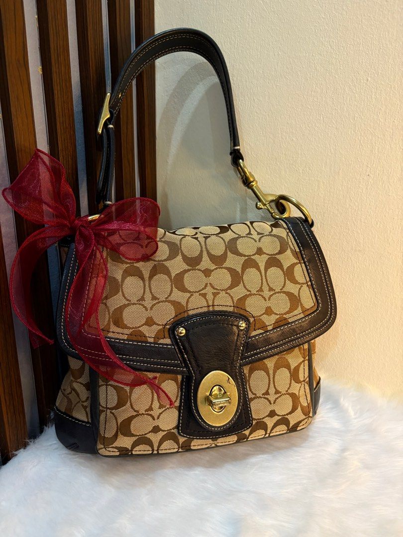 SOLD Coach Legacy Turnlock Shoulder Bag (Category: Other Accessories) located in San Fernando. Submitted by srhgrc (Listing ID 1416470414, Image 1). Description: -open for layaway -rank a condition -canvas 10/10 -leather 10/10 -hardwares 9/10 - slight scratch sa turnlock -super pretty in actual .